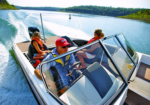 Small family ejoying a calm day out on the water