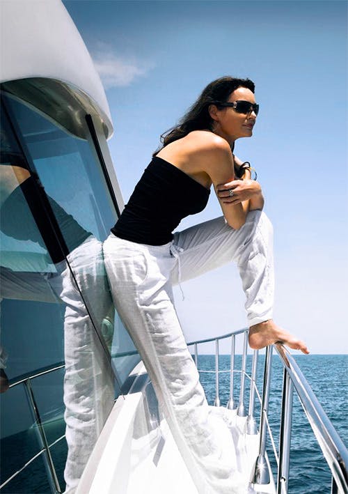 Woman enjoying the view from the bow of a Floirda yacht